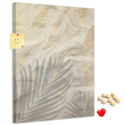 Kurk bedrukken woestijnzand met de delicate schaduw van een blad