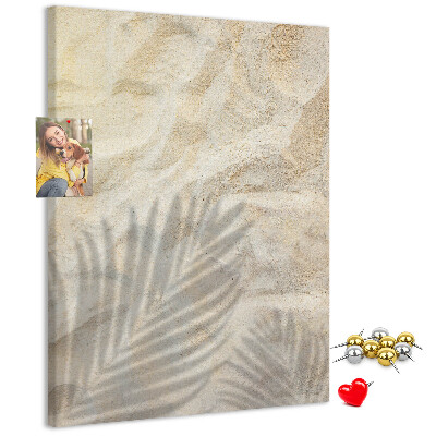 Kurk bedrukken woestijnzand met de delicate schaduw van een blad