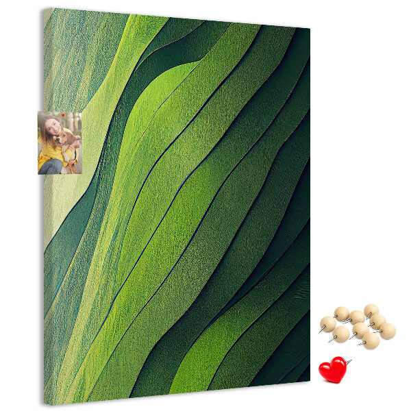 Memobord van kurk met een motief van groene bladeren in subtiele tinten