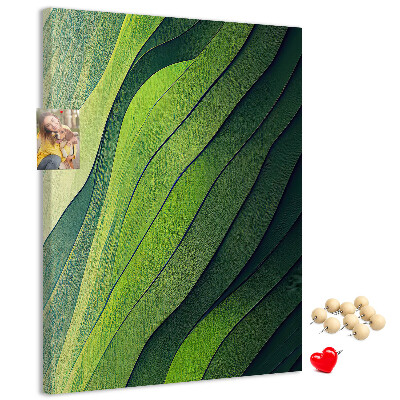 Memobord van kurk met een motief van groene bladeren in subtiele tinten