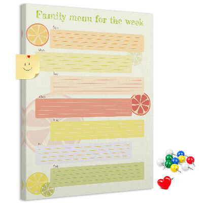 Kurken memobord met een kleurrijk weekmenu voor het gezin