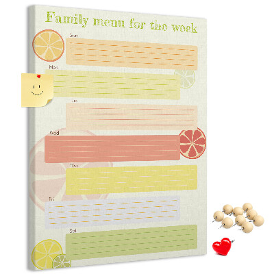 Kurken memobord met een kleurrijk weekmenu voor het gezin