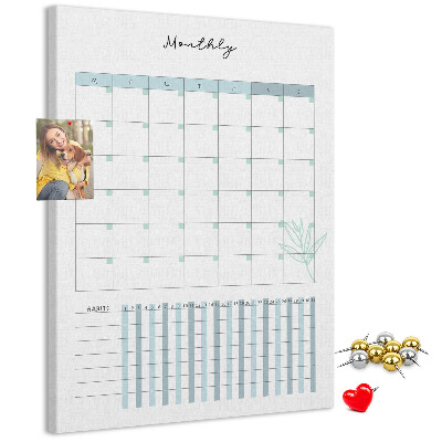 Kurken memobord met maandelijkse planning en bloemenprint