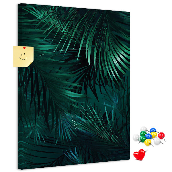 Memobord van kurk met tropische bladeren in diepe groene tinten