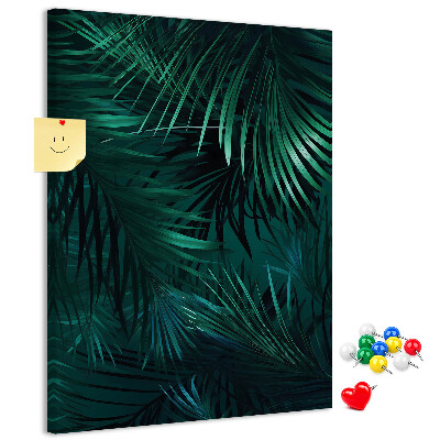 Memobord van kurk met tropische bladeren in diepe groene tinten