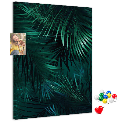 Memobord van kurk met tropische bladeren in diepe groene tinten