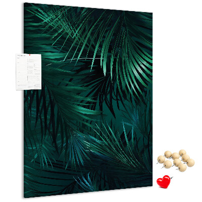Memobord van kurk met tropische bladeren in diepe groene tinten