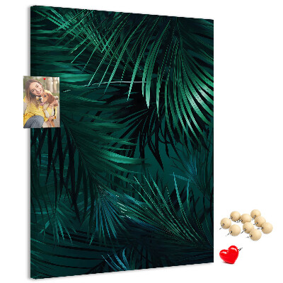 Memobord van kurk met tropische bladeren in diepe groene tinten