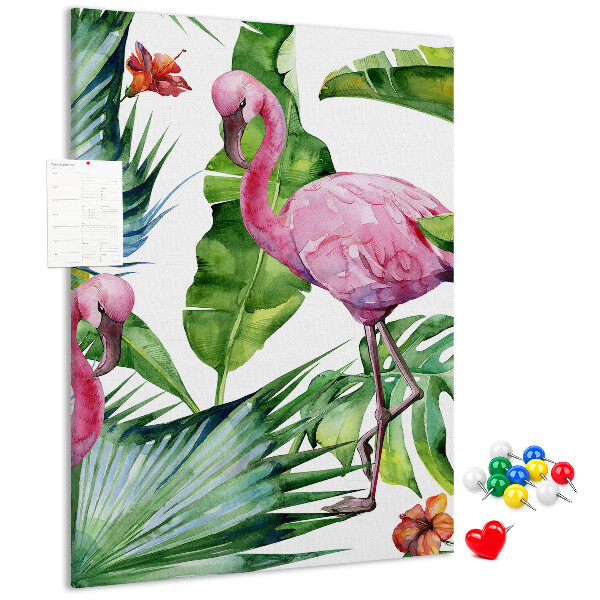 Prikbord van kurk met vrolijke flamingo's in een tropische omgeving