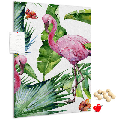 Prikbord van kurk met vrolijke flamingo's in een tropische omgeving