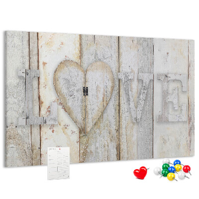 Kurk prikbord met houten plaquette met het woord 'liefde'