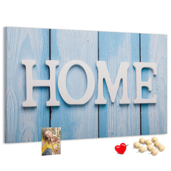 Prikbord stijlvol HOME-opschrift op een blauwe achtergrond