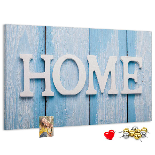 Prikbord stijlvol HOME-opschrift op een blauwe achtergrond