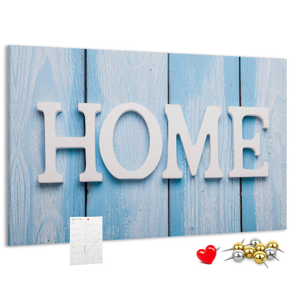 Prikbord stijlvol HOME-opschrift op een blauwe achtergrond