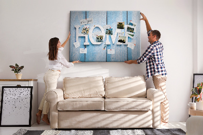 Prikbord stijlvol HOME-opschrift op een blauwe achtergrond