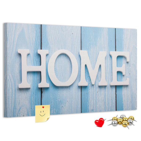 Prikbord stijlvol HOME-opschrift op een blauwe achtergrond