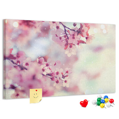 Prikbord met afbeelding van bloemtakken in pasteltinten