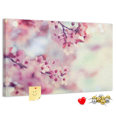 Prikbord met afbeelding van bloemtakken in pasteltinten