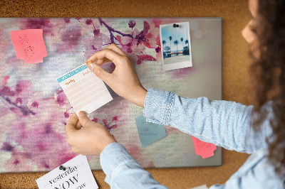 Prikbord met afbeelding van bloemtakken in pasteltinten