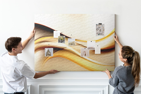 Prikbord met gouden golven op een neutrale achtergrond