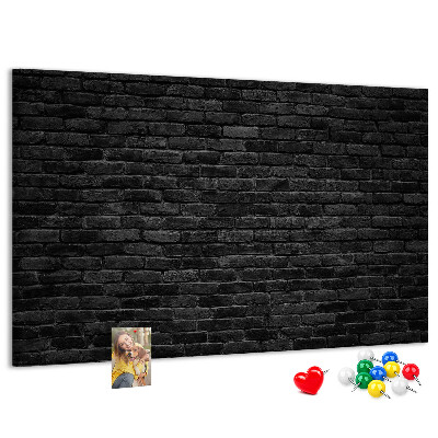 Kurkbord close-up van een donkere gestructureerde bakstenen muur