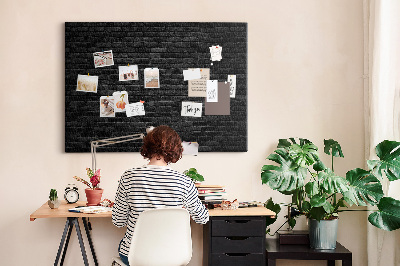 Kurkbord close-up van een donkere gestructureerde bakstenen muur