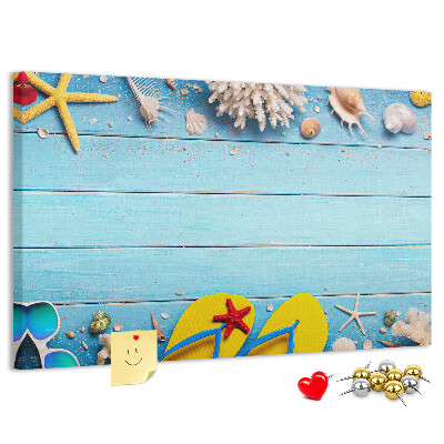 Prikbord zomerherinneringen aan het strand met schelpen