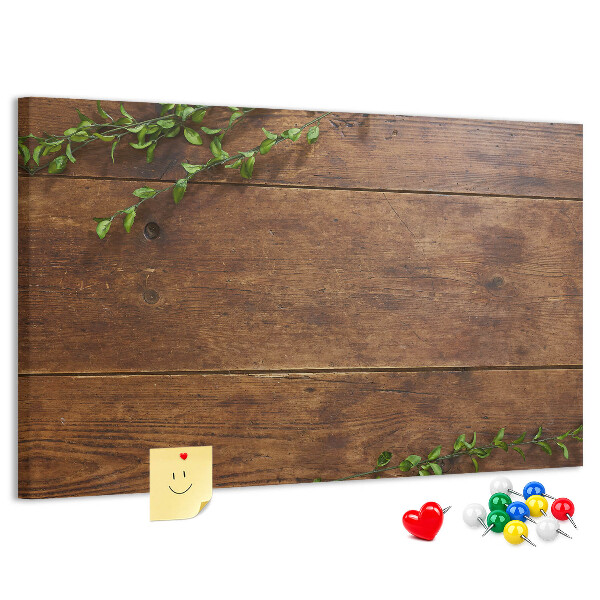 Prikbord natuurlijk hout met groene takken