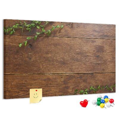 Prikbord natuurlijk hout met groene takken