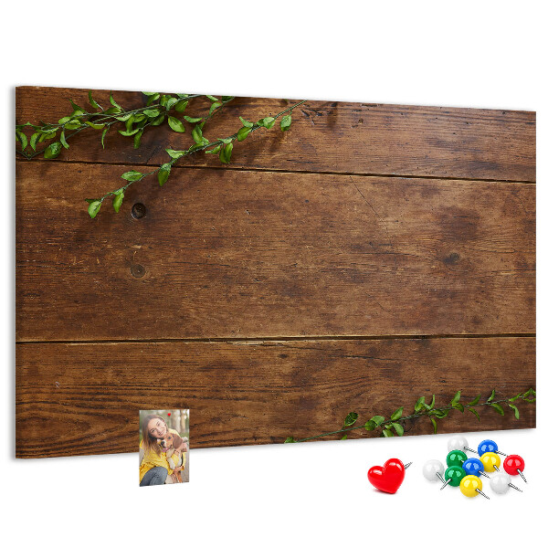 Prikbord natuurlijk hout met groene takken