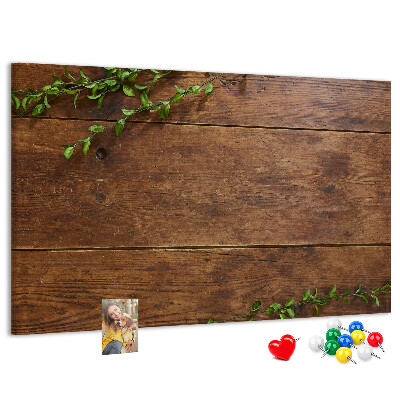 Prikbord natuurlijk hout met groene takken