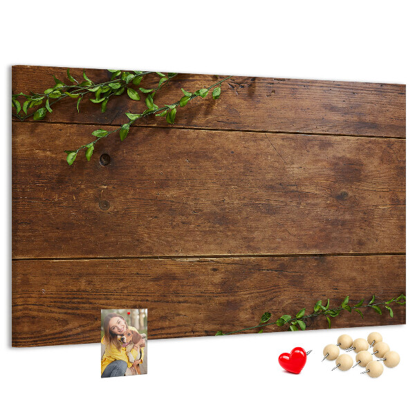 Prikbord natuurlijk hout met groene takken