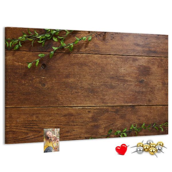 Prikbord natuurlijk hout met groene takken
