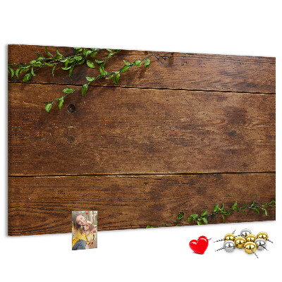 Prikbord natuurlijk hout met groene takken