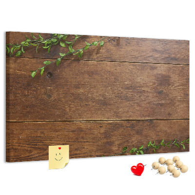 Prikbord natuurlijk hout met groene takken