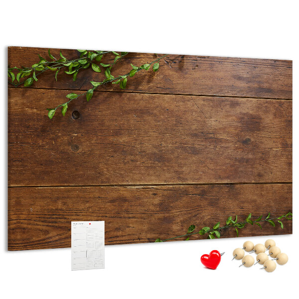Prikbord natuurlijk hout met groene takken