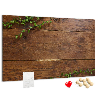 Prikbord natuurlijk hout met groene takken