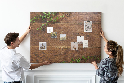 Prikbord natuurlijk hout met groene takken
