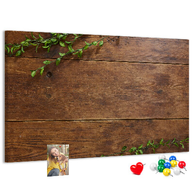 Prikbord natuurlijk hout met groene takken
