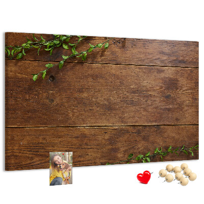 Prikbord natuurlijk hout met groene takken