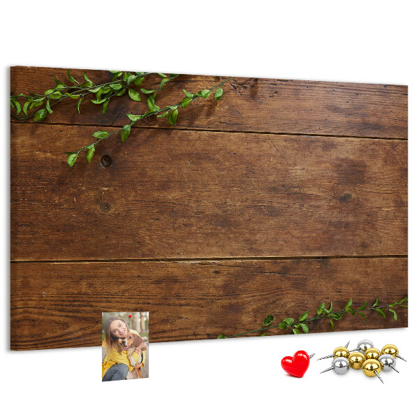Prikbord natuurlijk hout met groene takken
