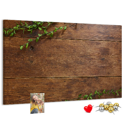 Prikbord natuurlijk hout met groene takken