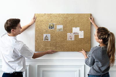 Kurk prikbord met een gouden textuur in een minimalistische stijl