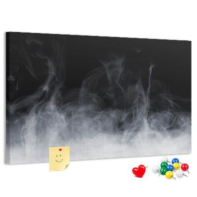 Prikbord sensuele dans van mist op een zwarte achtergrond