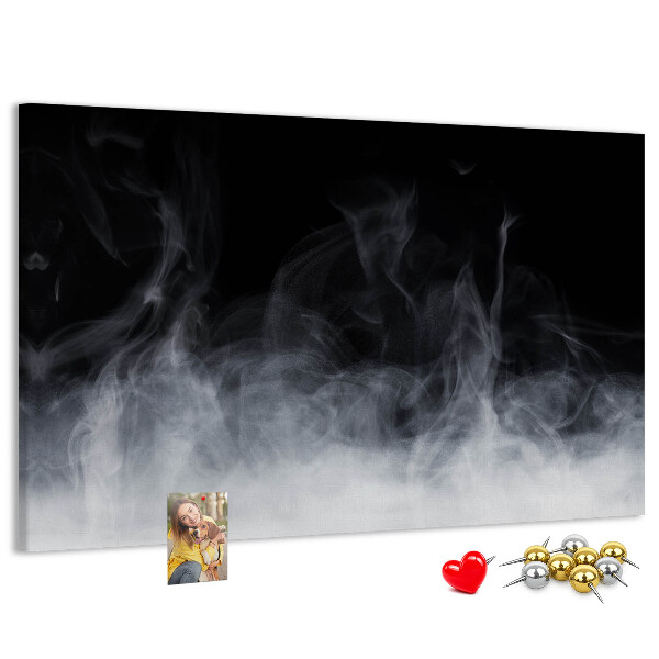 Prikbord sensuele dans van mist op een zwarte achtergrond