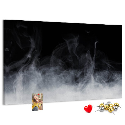 Prikbord sensuele dans van mist op een zwarte achtergrond