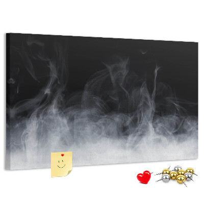 Prikbord sensuele dans van mist op een zwarte achtergrond
