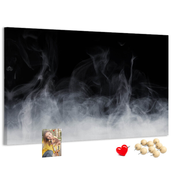 Prikbord sensuele dans van mist op een zwarte achtergrond