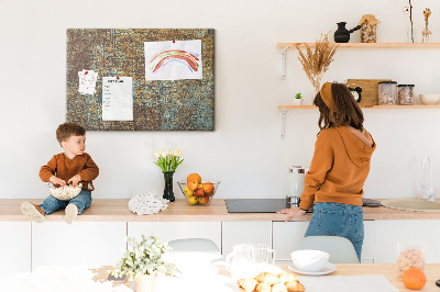 Prikbord met roestig oppervlak en blauwe accenten