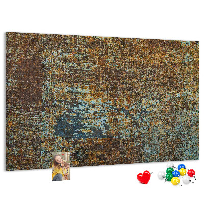 Prikbord met roestig oppervlak en blauwe accenten